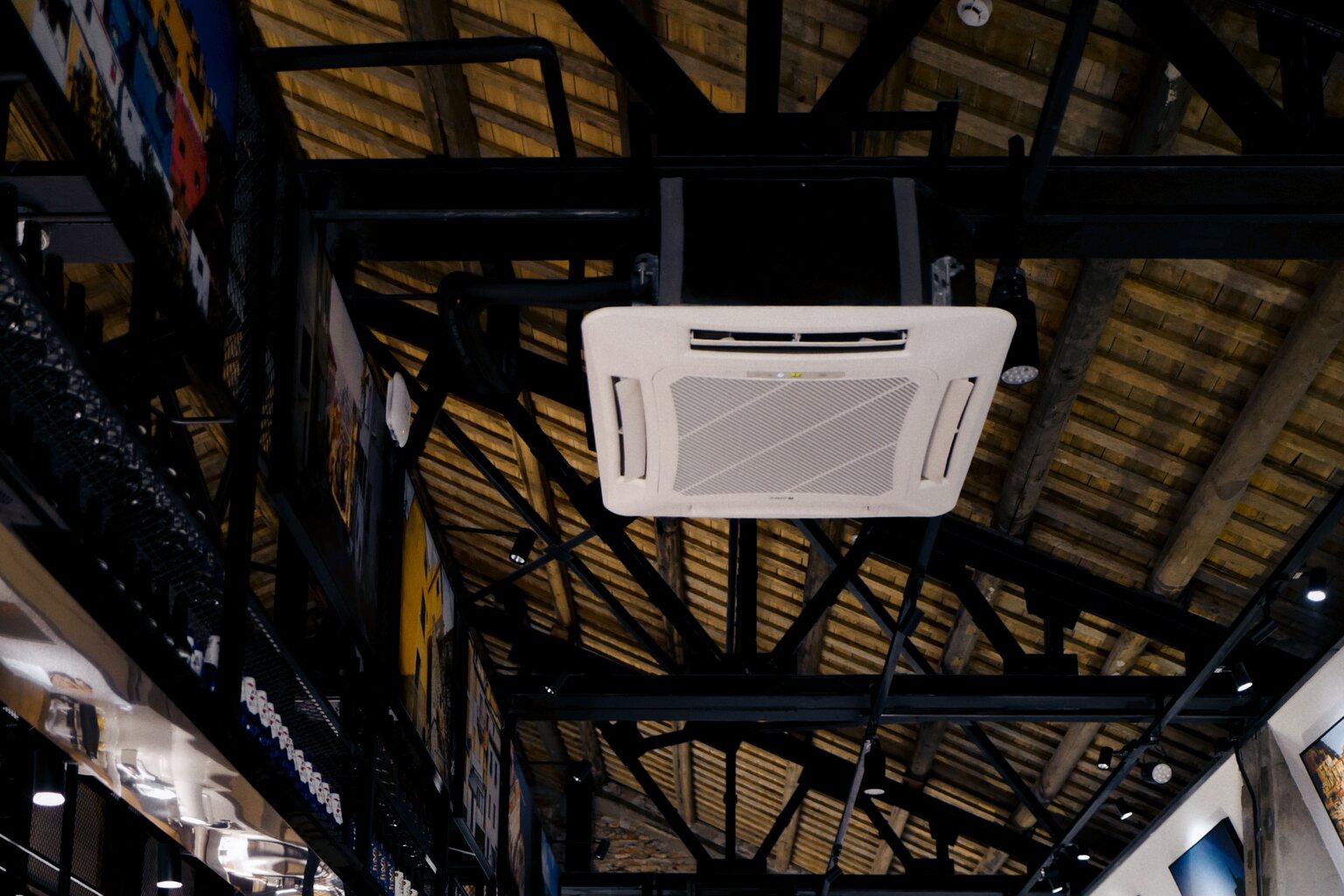 Ceiling cassette serving a modern commercial space as part of a multi-zone HVAC system